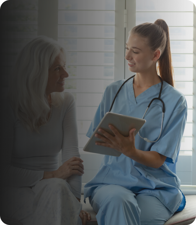 Nurse showing a tablet to a patient in the Text Word by Word demo