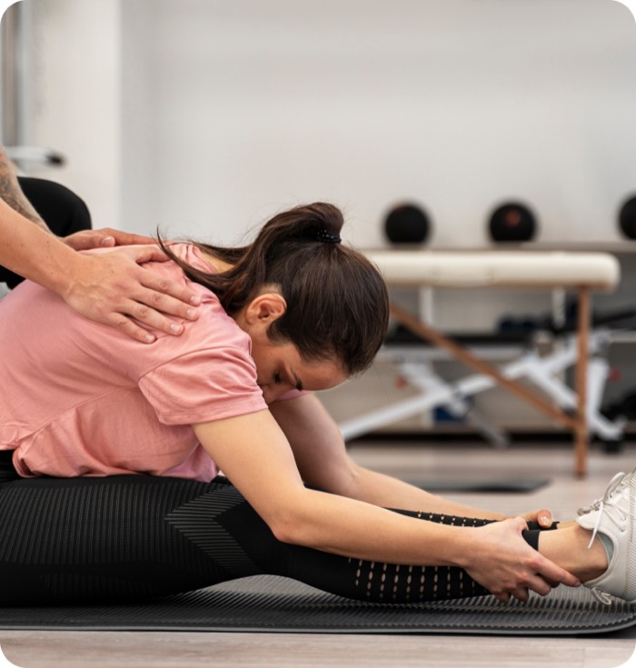 Physical therapist treating a patient