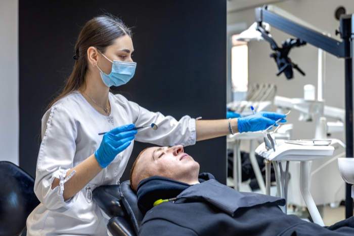 Dentist treating a patient