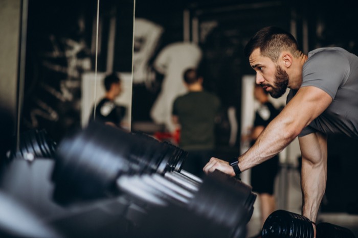 Man exercising on a rowing machine